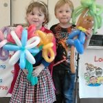 Happy with their balloon gifts